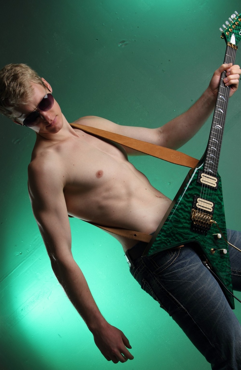 Male model photo shoot of GuitarArt