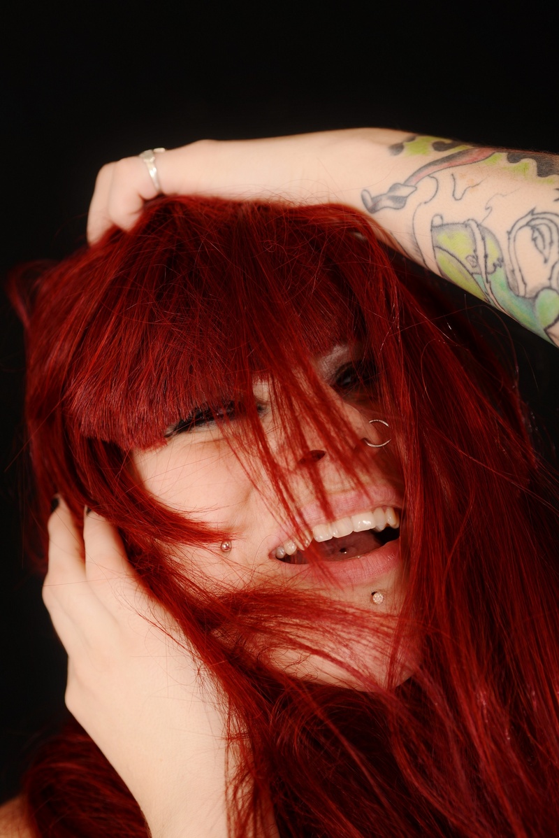 Female model photo shoot of Elektrafire by PhotoSeven