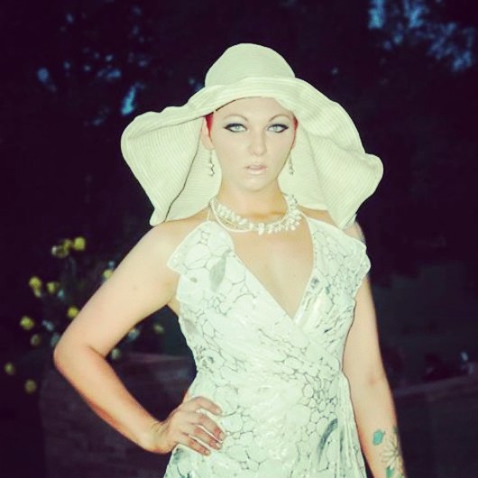 Female model photo shoot of Constance Valladares in LINEN & LAWNS EVENT