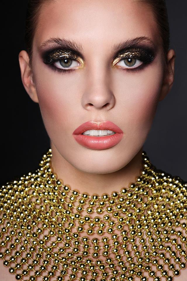 Female model photo shoot of Clare Mac Makeup Artist