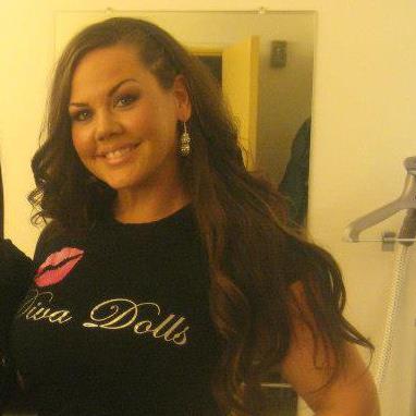 Female model photo shoot of Diva Dolls Studio in t.v interview