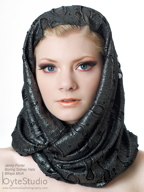 Female model photo shoot of BKaye MUA by ByteStudio, clothing designed by Boring Sidney Hats