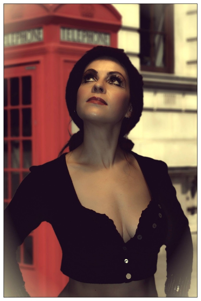 Female model photo shoot of Scarlet Enigma