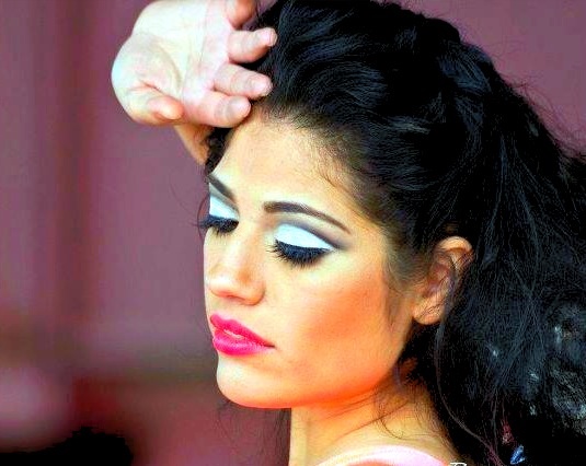 Female model photo shoot of Faces by Design Makeup 