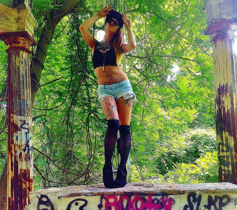Female model photo shoot of Rae Holiday in Hell House Baltimore Maryland