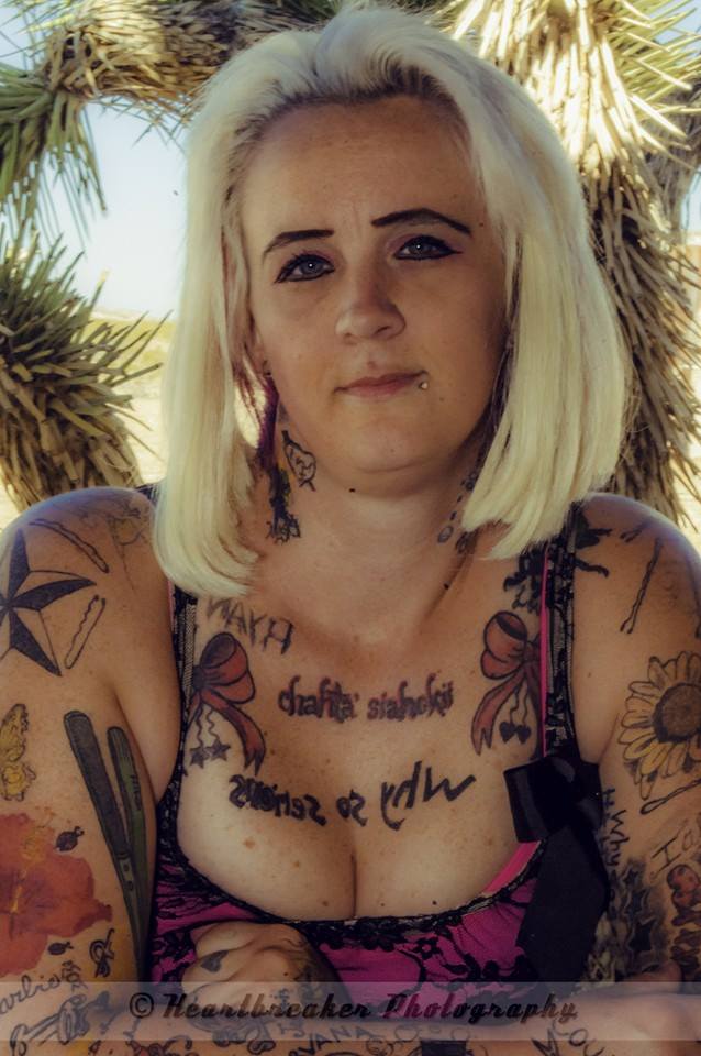 Female model photo shoot of tattooed southern belle in applevalley california