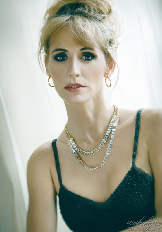 Female model photo shoot of RikkiLynn by Aurora V Photography, makeup by Laura Evans