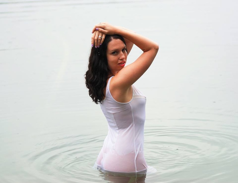 Female model photo shoot of Whiskey Winter in Lake Muskoka