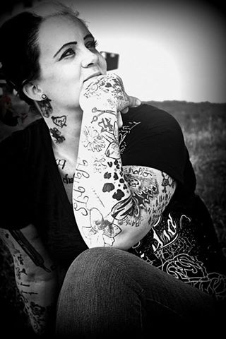 Female model photo shoot of tattooed southern belle in california