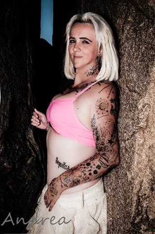 Female model photo shoot of tattooed southern belle