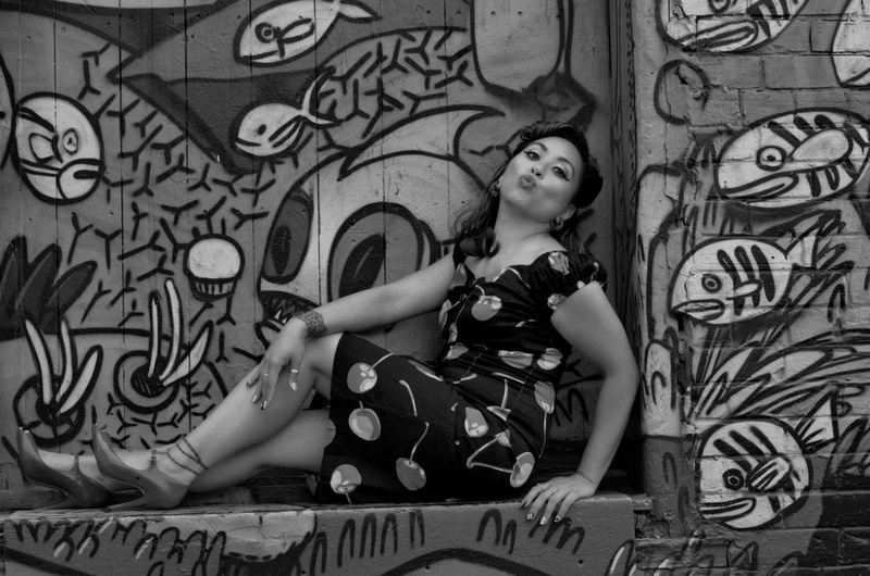 Female model photo shoot of Cecile Arietta in Graffiti Alley, Toronto, ON