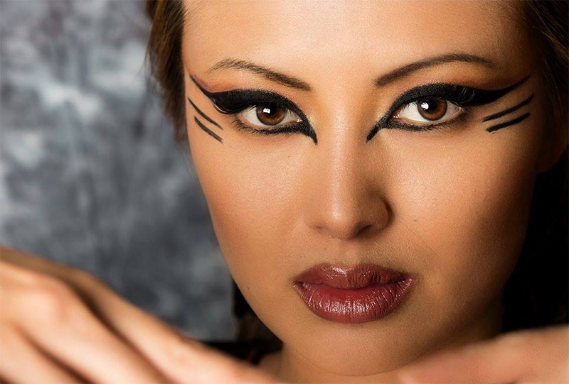 Female model photo shoot of Makeup by Domonique in Top Secret