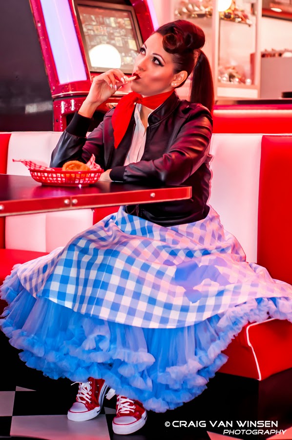 Female model photo shoot of Pandora S Boxxx in Franky's Diner