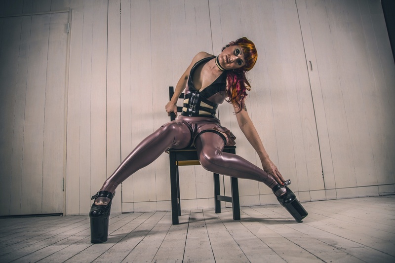 Female model photo shoot of Lyra Fae in Rubber Republik