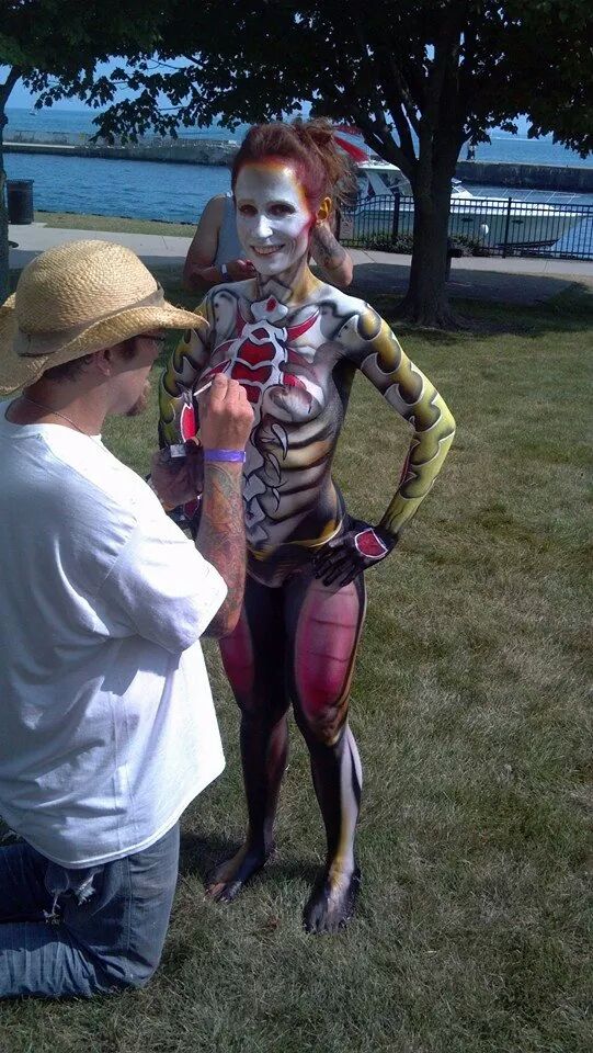 Female model photo shoot of Miss Scarlett in Mosquitoe Festival Bodypaint Competition 2014 @ Waukegan Beach,  Illinois