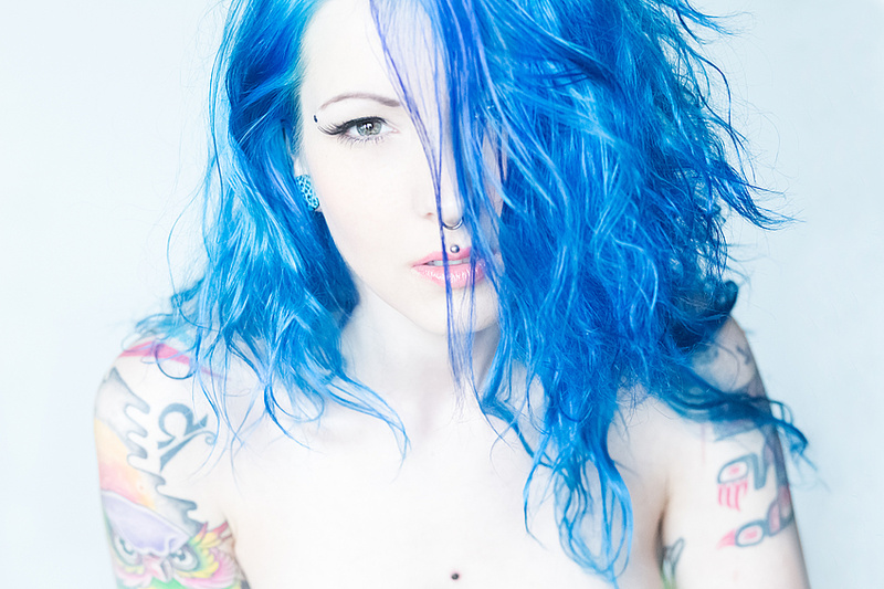 Female model photo shoot of Smurfette