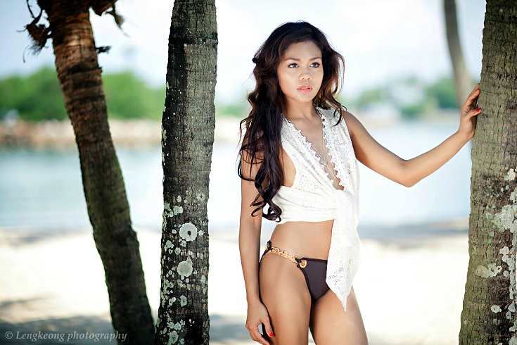 Female model photo shoot of Krish San Diego in Tanjong Beach, Sentosa, Singapore