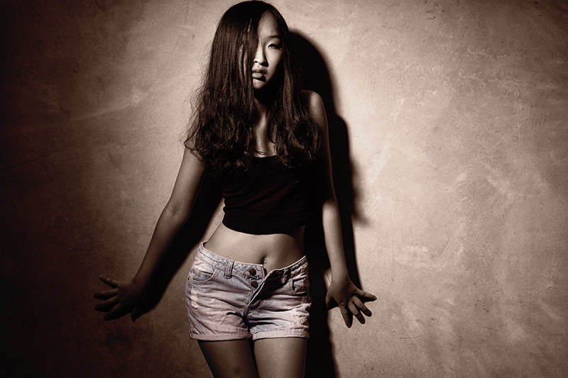 Female model photo shoot of Teana MA in warehouse studio