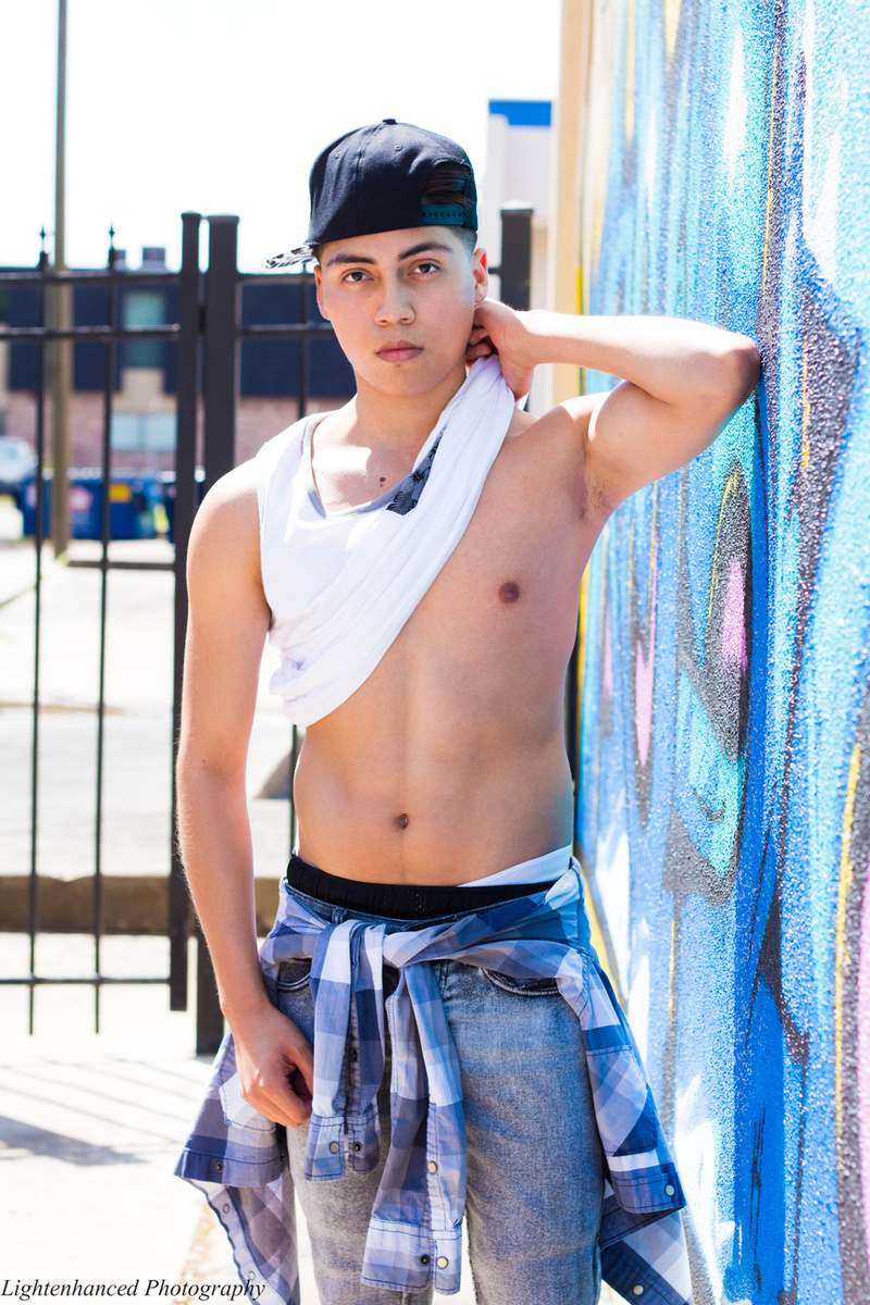 Male model photo shoot of Alejandro Camacho in Houston Downtown