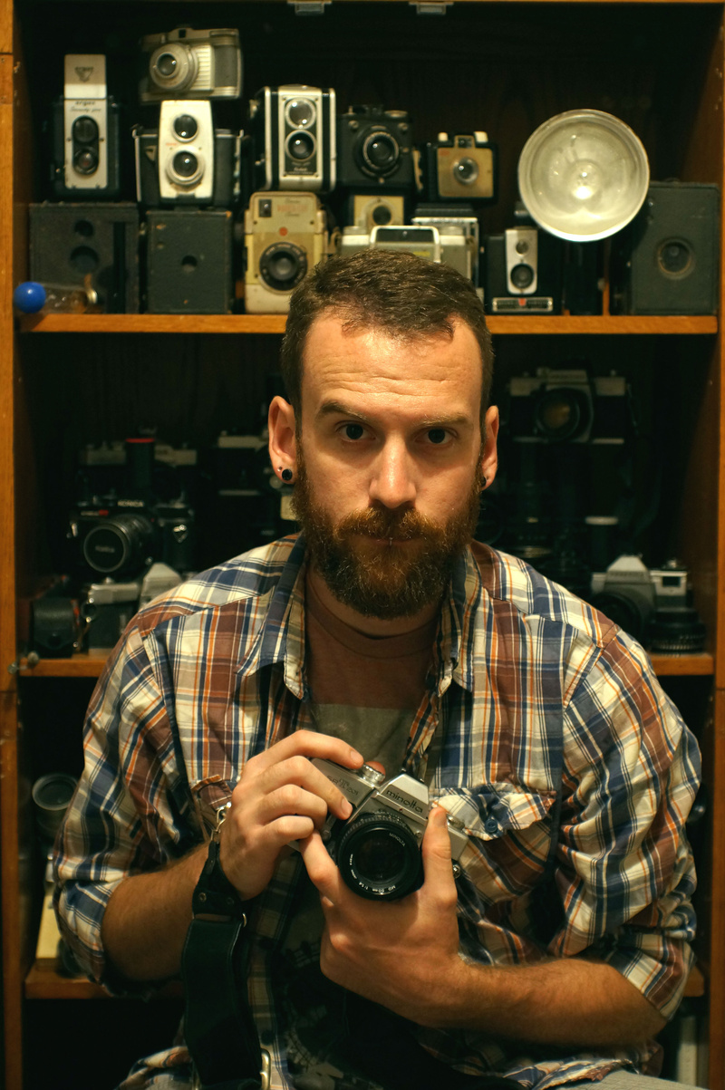 Male model photo shoot of Bearded Photog
