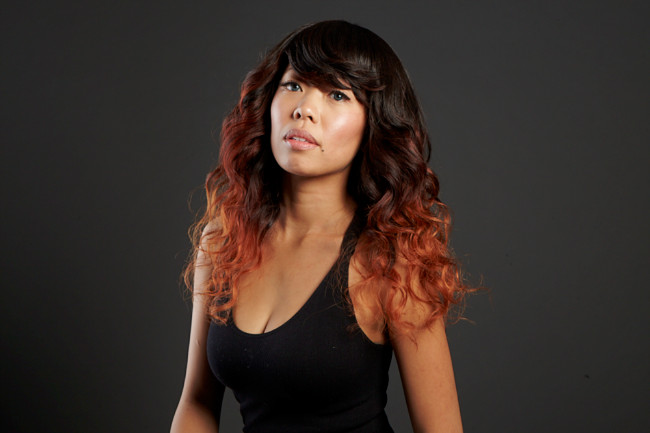 Female model photo shoot of DivaDesigns Hair Studio by Dwayne Evans Photograph