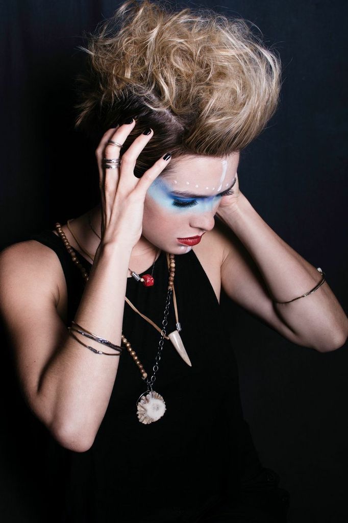 Female model photo shoot of Rola Makeup\\Hair