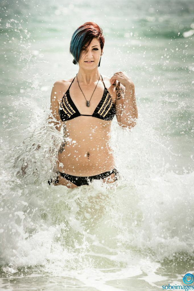Female model photo shoot of KyraRae by SoBe Images in Miami Beach, FL