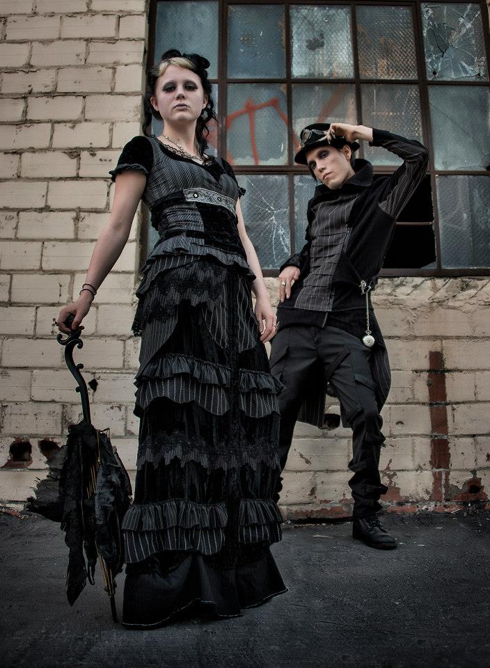 Male and Female model photo shoot of Lucid Luminos and Kitty Nyu by The Wanderer in Oakland, CA, clothing designed by Wysterium Wear