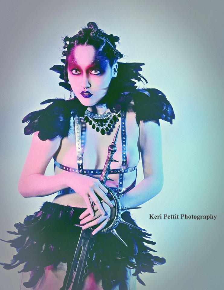 Female model photo shoot of Haffa by Keri Pettit, makeup by Rick Bishop