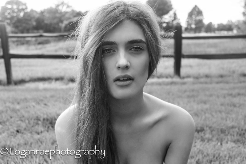 Female model photo shoot of Logan Rae Photography