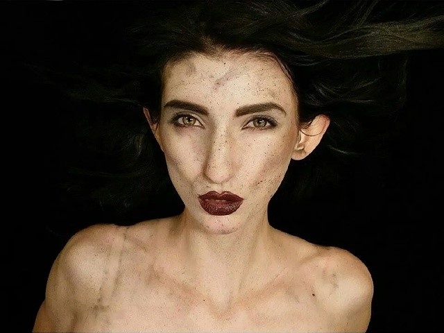 Female model photo shoot of Katlin Sumners, makeup by Model Ready MUA-HAIR