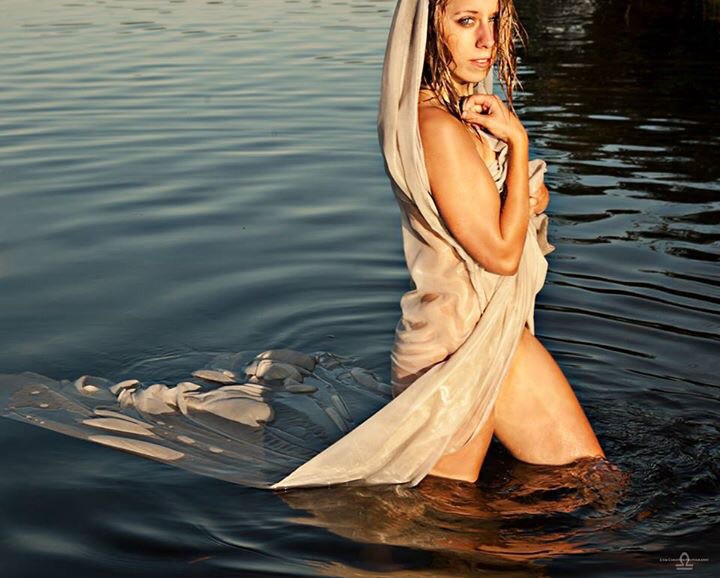 Female model photo shoot of Maddest Hatter in Lake