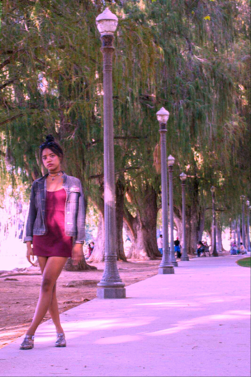 Female model photo shoot of ymani in Downtown Riverside