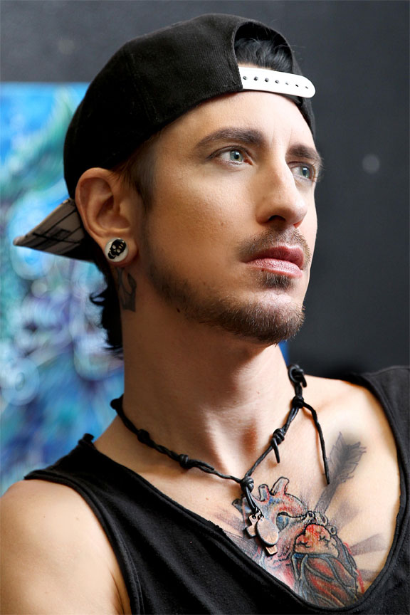 Male model photo shoot of Aiden Arrows by Joshua Kodis in Skin Deep Tattoo's Great Falls MT.