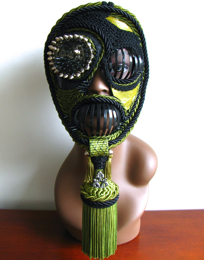 Female model photo shoot of Oculto Masks in http://ocultomasks.carbonmade.com/