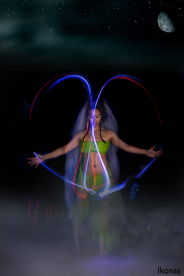Male and Female model photo shoot of ikonas Boston and Oryon Aam in Effect created with LED light painting technique
