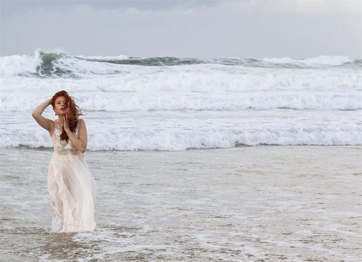 Female model photo shoot of EveTamnooni in Tel Aviv beach
