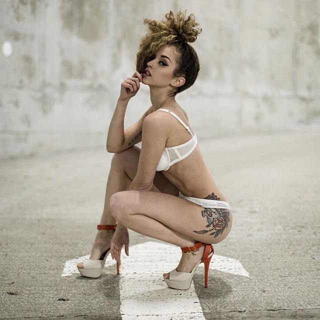 Female model photo shoot of Thyrdculturekyd
