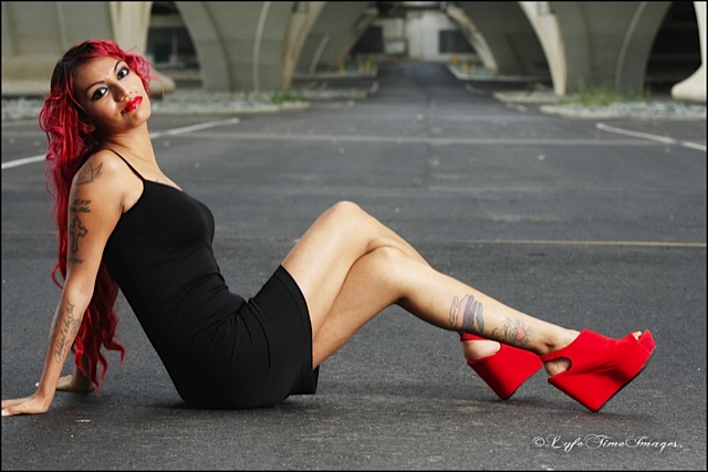 Female model photo shoot of tatted ri