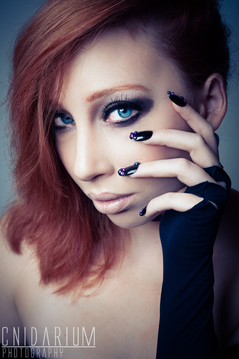 Female model photo shoot of Cnidarium Photography