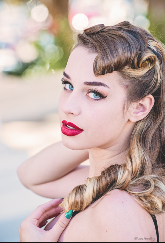 Female model photo shoot of Eiraina Ladell in Spreckles Organ Pavilion in Balboa Park