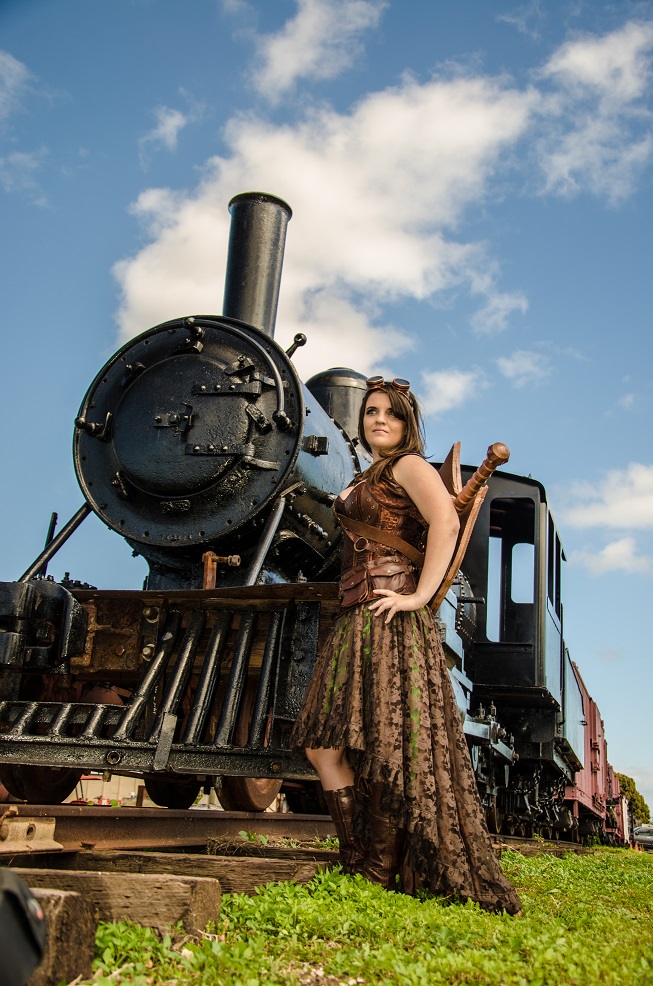 Female model photo shoot of Jenn Funk Photography in Ewa Train Yard