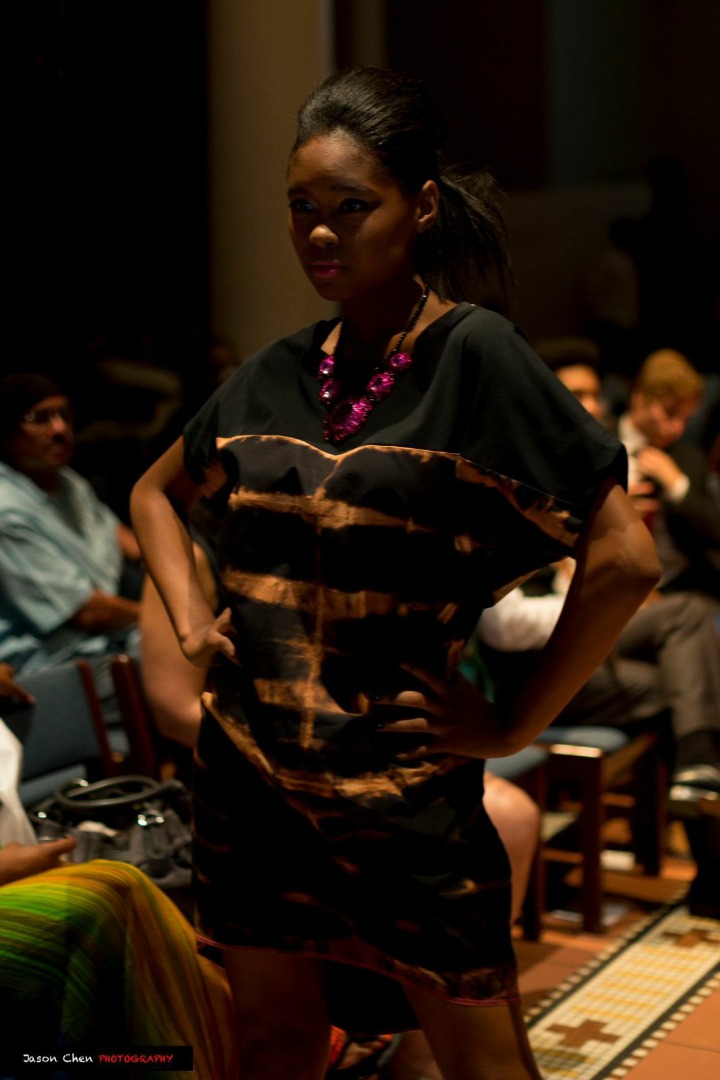 Female model photo shoot of Tahji Antonio, clothing designed by TaviaSanza
