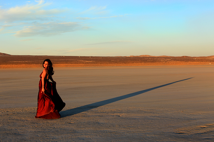 Female model photo shoot of Warrior Gypsy Eagle in El Mirage Desert