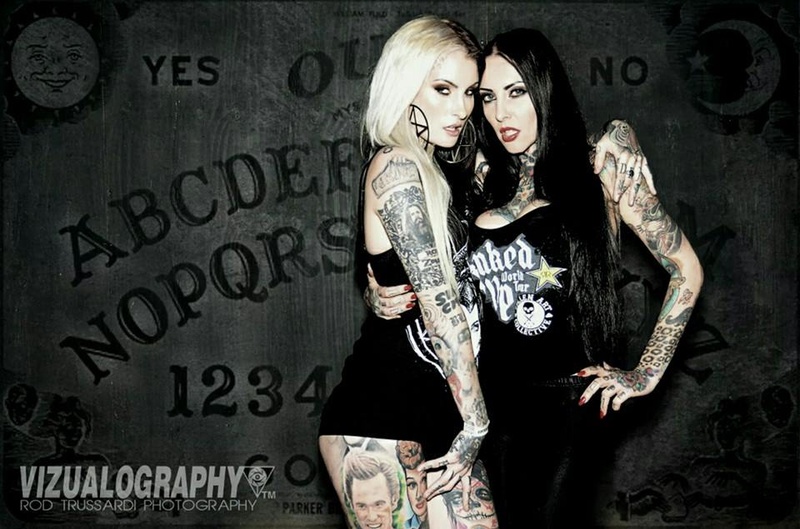 Female model photo shoot of Lusy Logan and Makani Terror in London Tattoo Convention