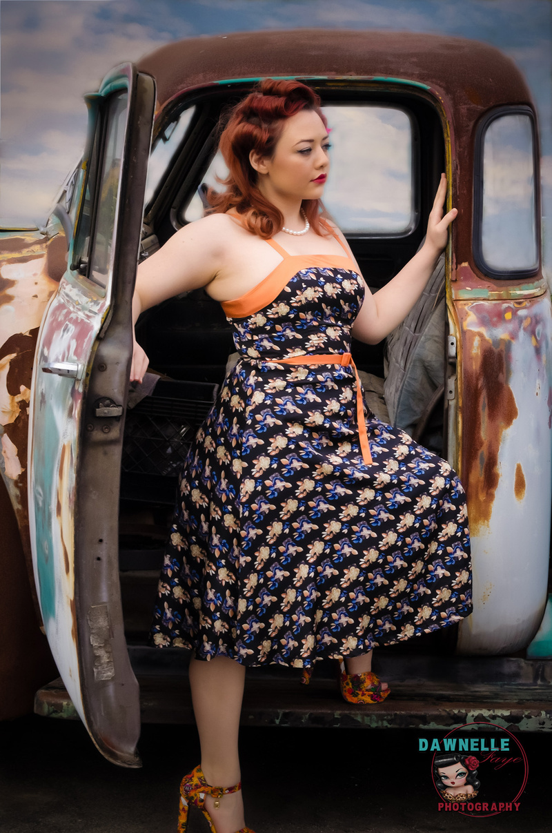 Female model photo shoot of dawnellefayephotography in Maciel Autobody in Salinas