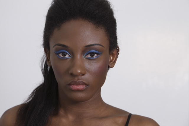 Female model photo shoot of Makeup By Pha