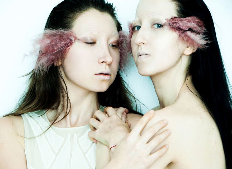 Female model photo shoot of Yin Yang Sisters in Poland