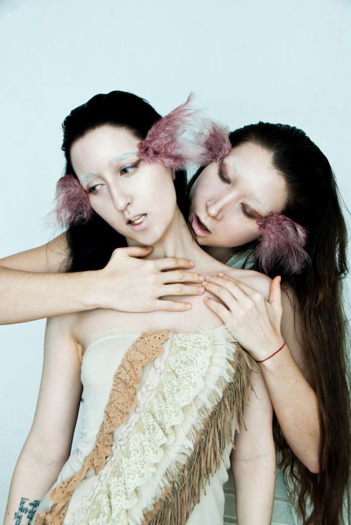 Female model photo shoot of Yin Yang Sisters in Poland
