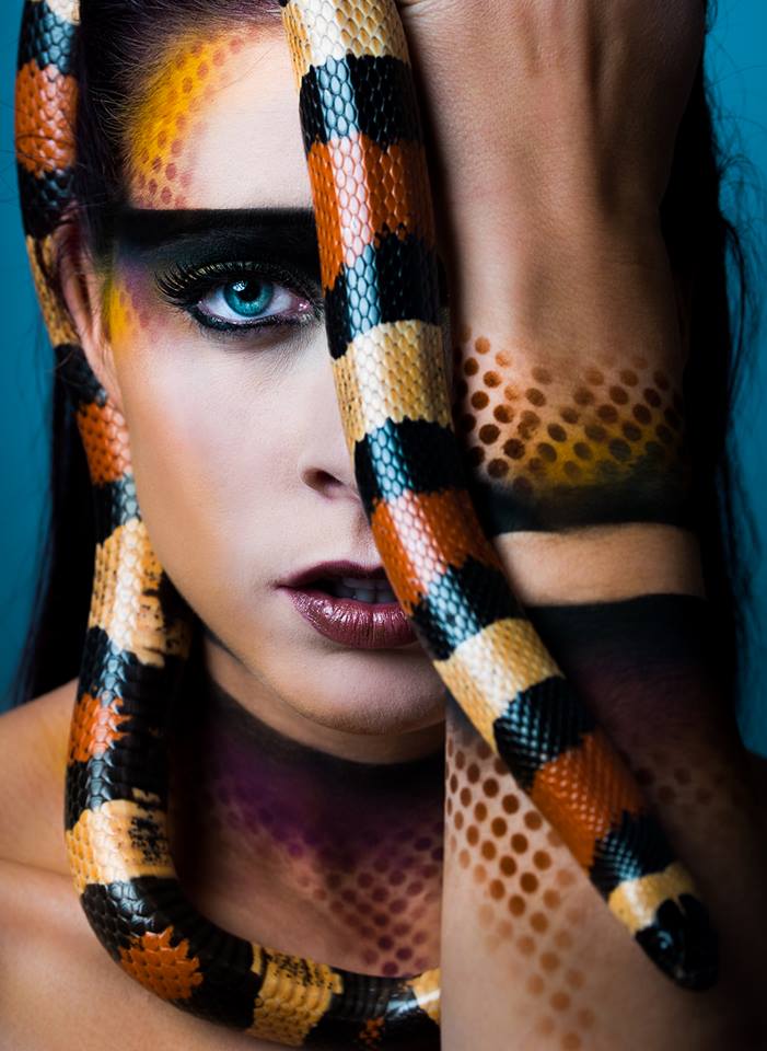Female model photo shoot of Mardi Gras Face Art in Winnipeg